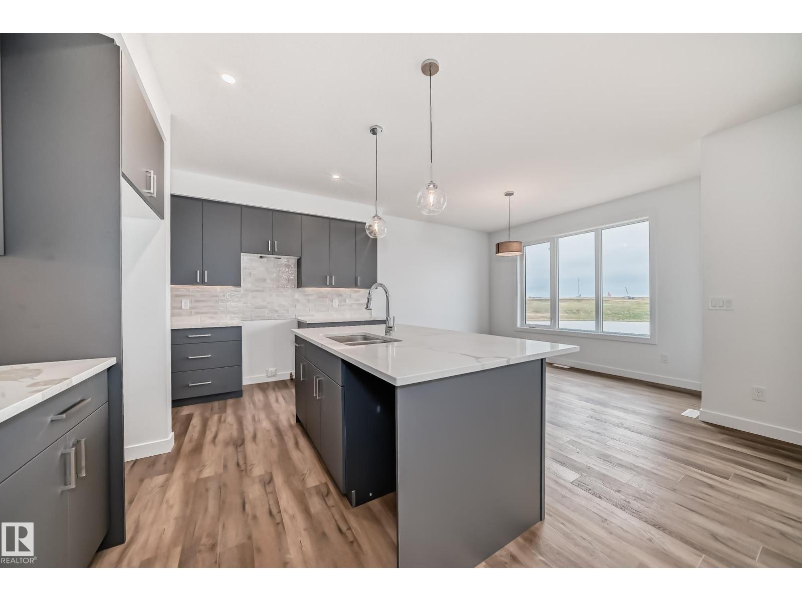Photo 12 of 10226 92 A Av, Morinville AB