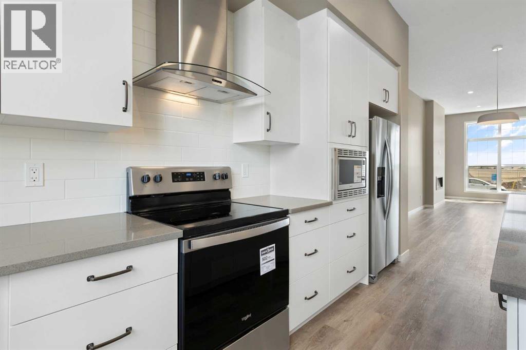 Photo 18 of 415 Hotchkiss Manor Se, Calgary AB