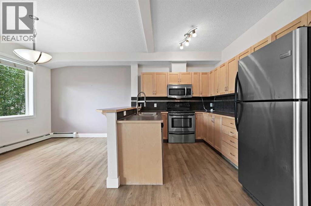 Photo 5 of 1212 211 Aspen Stone Boulevard Sw, Calgary AB