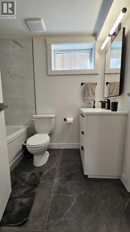 Photo 19 of 4703 26 Avenue Sw, Calgary AB