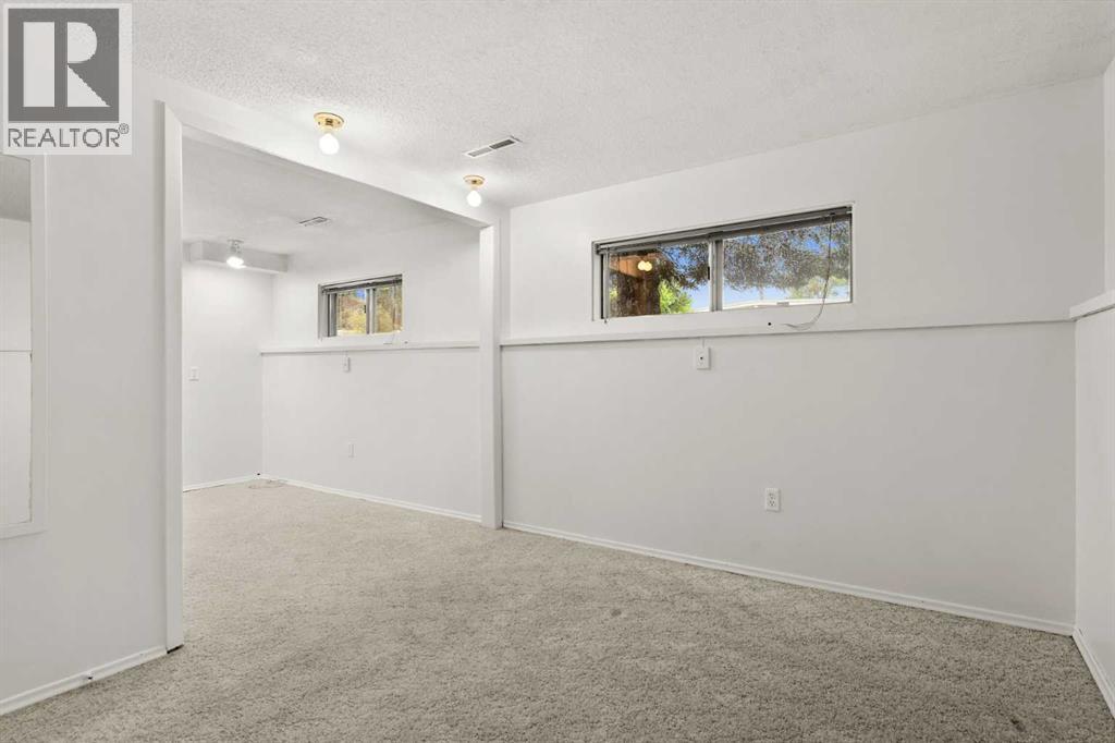 Single Family House Bi-level for Sale in  Breen Crescent NW Brentwood Calgary 