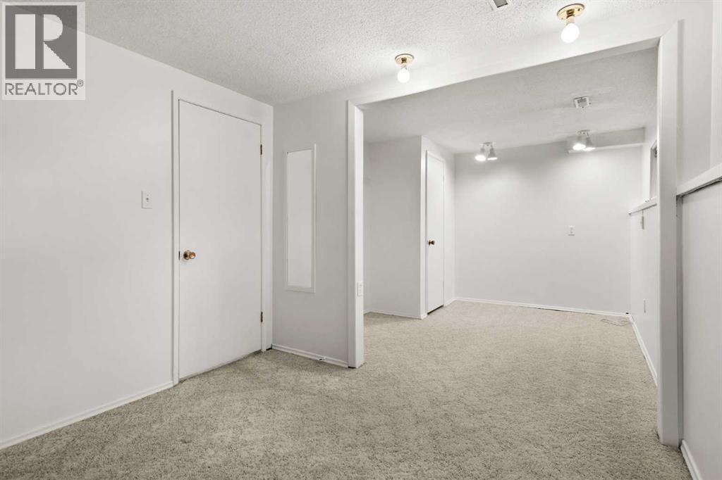 Single Family House Bi-level for Sale in  Breen Crescent NW Brentwood Calgary 