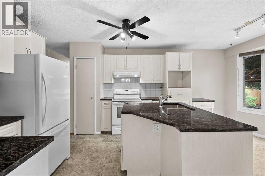 Single Family House Bi-level for Sale in  Breen Crescent NW Brentwood Calgary 