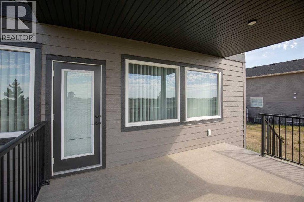 Photo 50 of 38 Springfield Boulevard, Sylvan Lake AB
