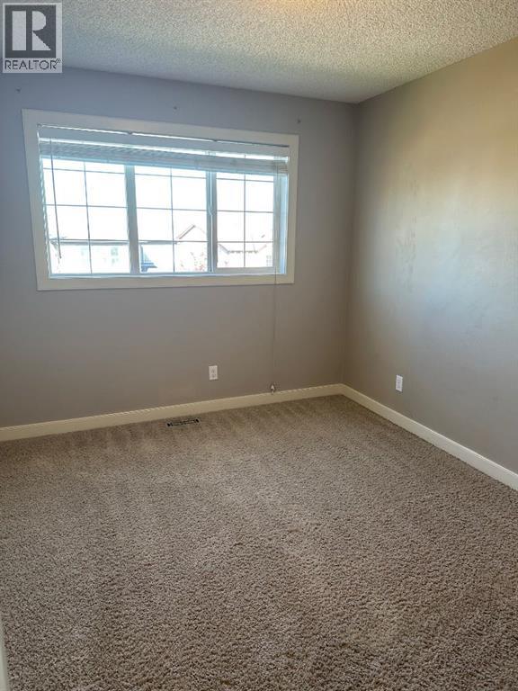 Photo 7 of 571 Panatella Boulevard Nw, Calgary AB