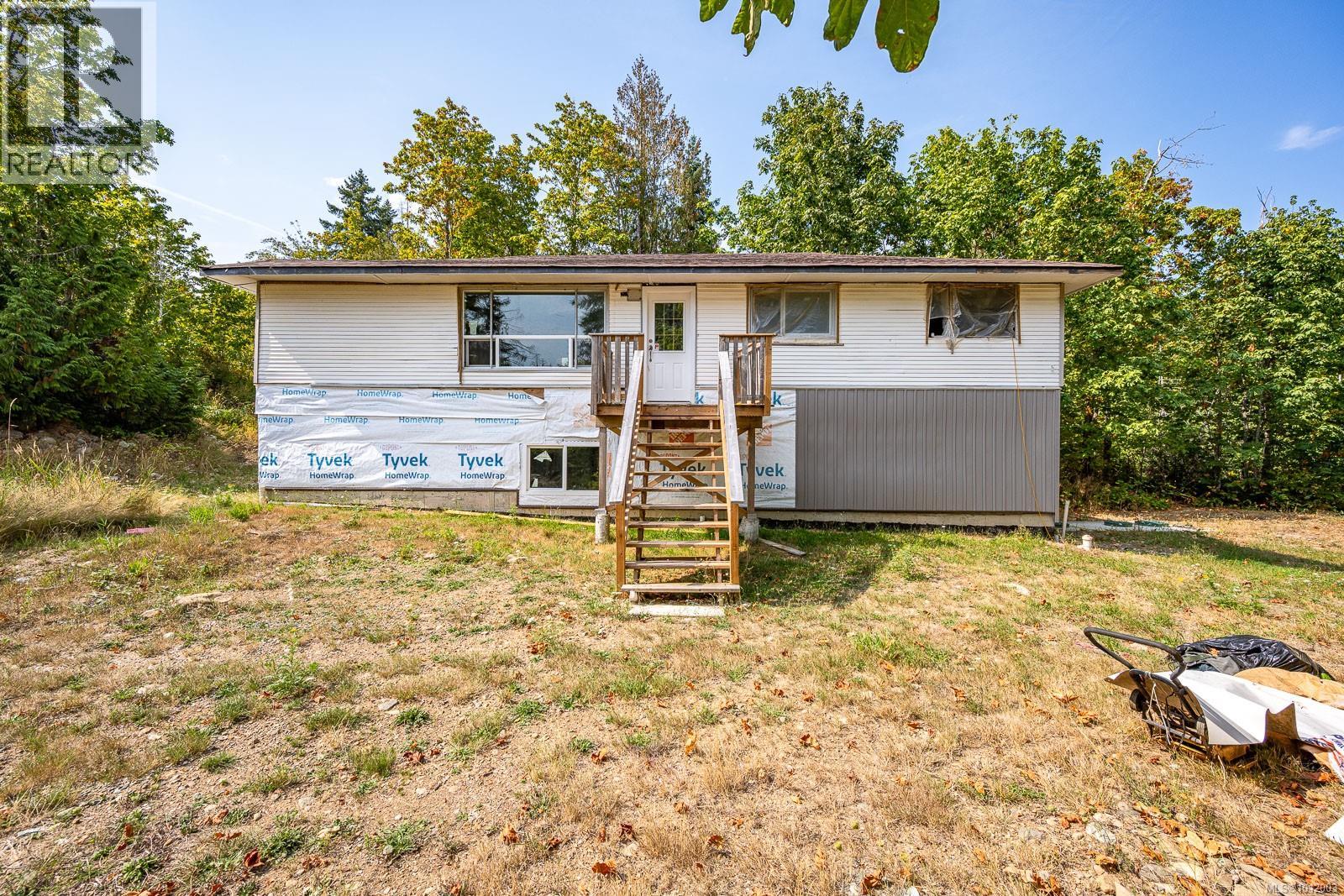 Photo 7 of 7390 Cougar Smith Rd, Fanny Bay BC