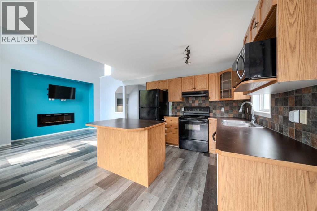Single Family House for Sale in  Everstone Avenue SW Evergreen Calgary 