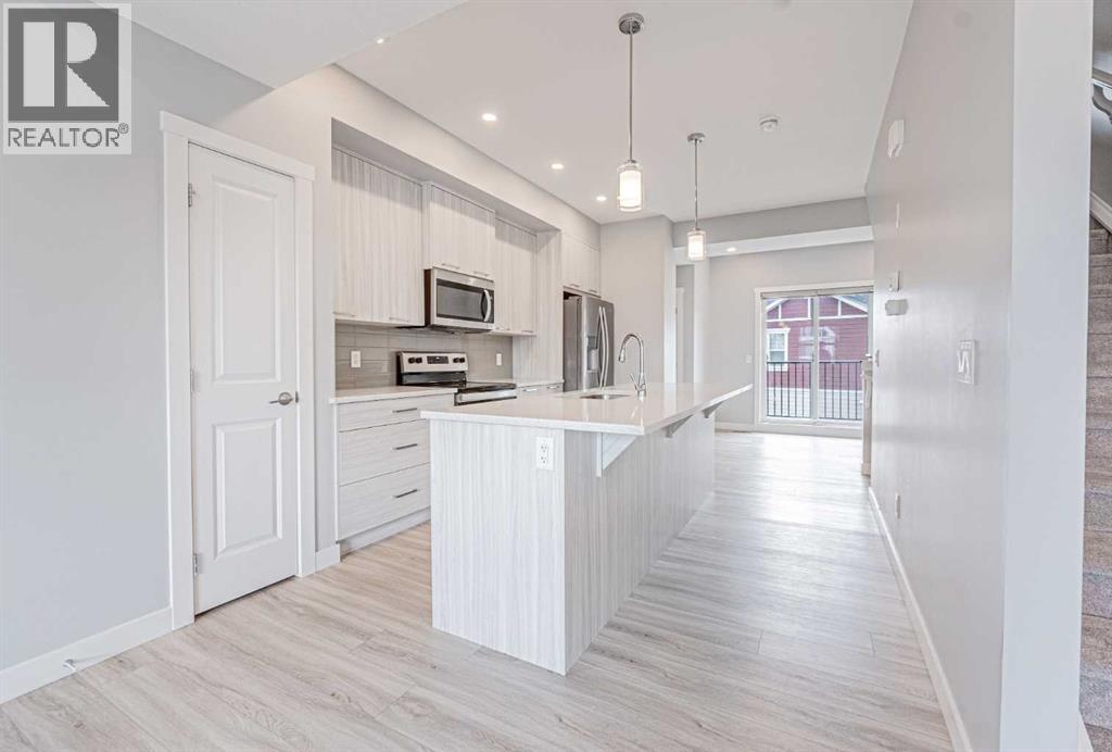 Photo 11 of 601 115 Sagewood Drive Sw, Airdrie AB