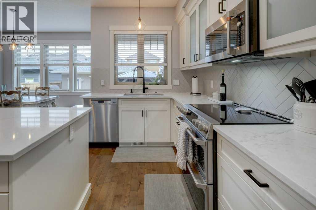 Photo 11 of 1138 Coopers Drive Sw, Airdrie AB