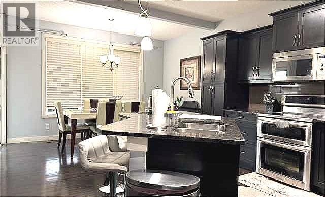 Photo 7 of 691 Copperpond Circle Se, Calgary AB