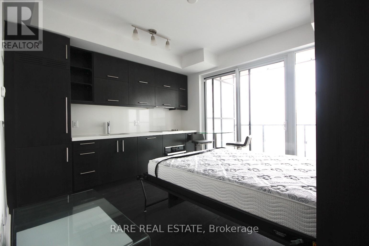 Photo 1 of 3110 65 St Mary Street, Toronto ON