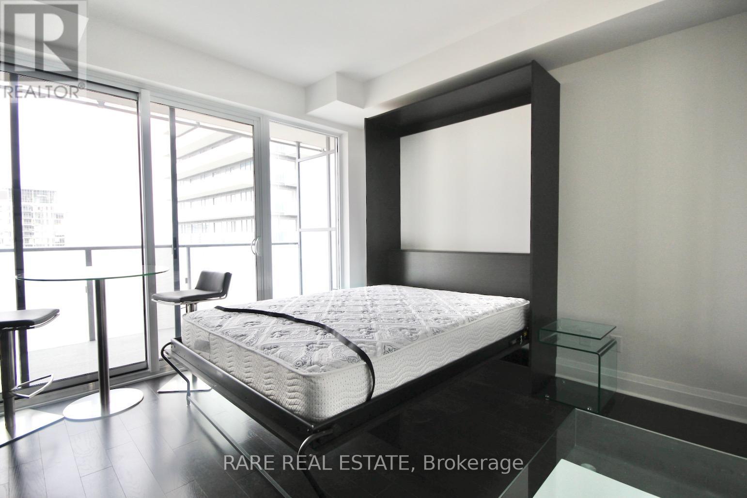 Photo 2 of 3110 65 St Mary Street, Toronto ON