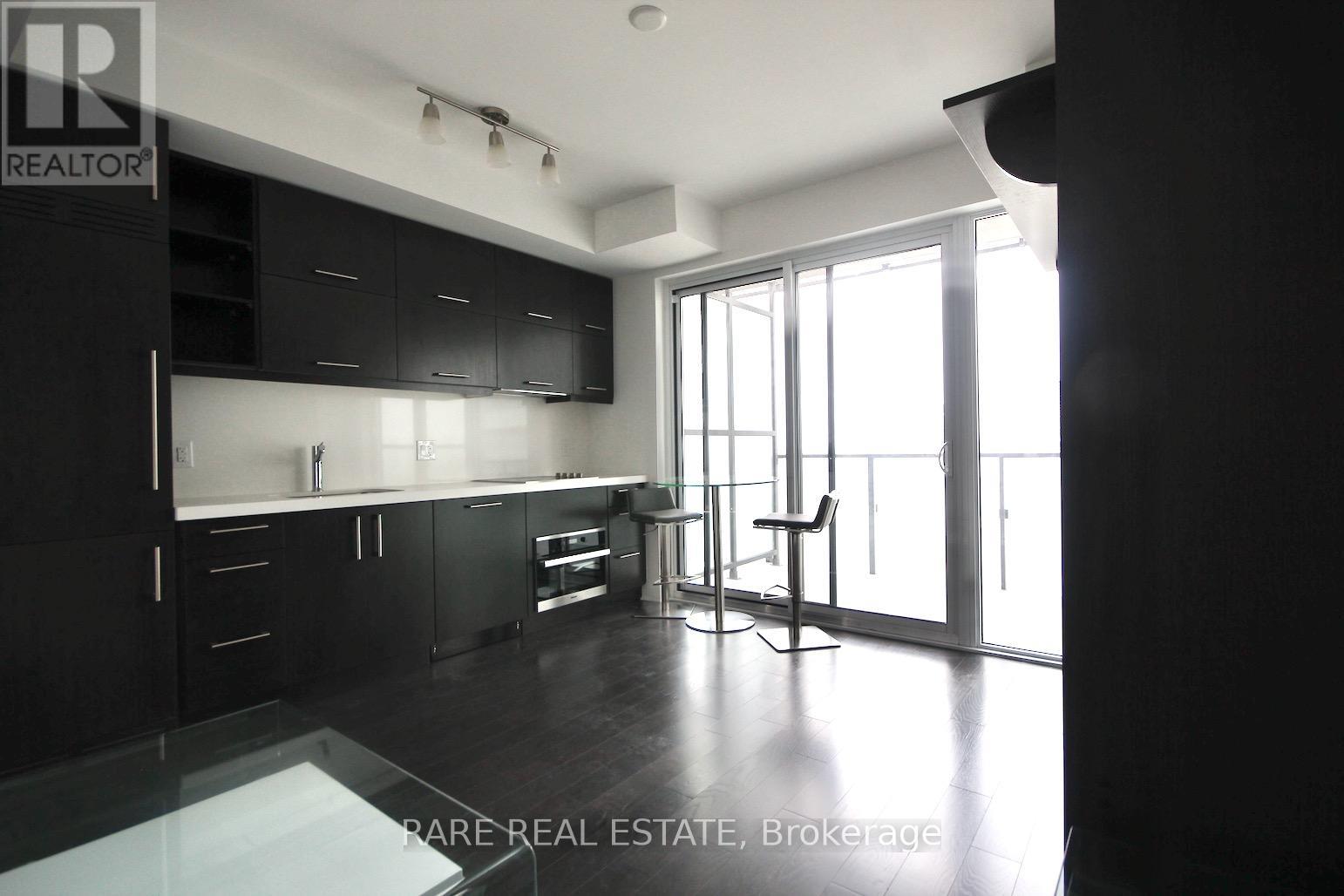 Photo 3 of 3110 65 St Mary Street, Toronto ON