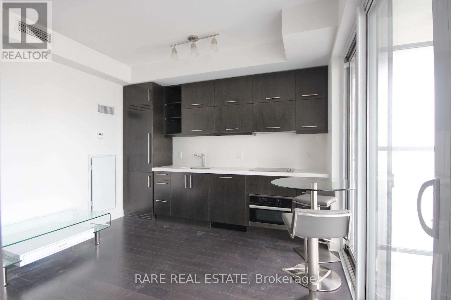 Photo 5 of 3110 65 St Mary Street, Toronto ON