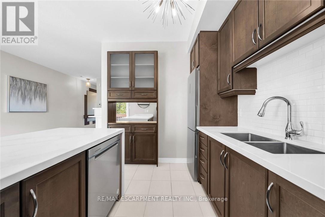 Photo 21 of 25 70 Plains Road W, Burlington ON