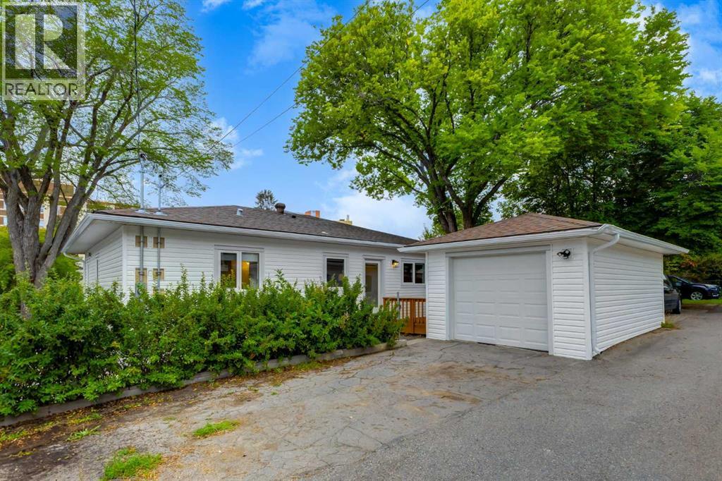 Single Family House Bungalow for Sale in  Crescent Road NW Rosedale Calgary 