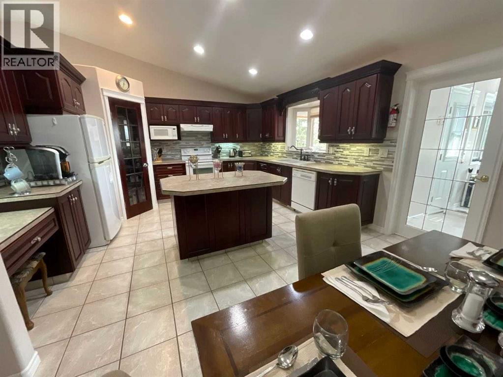Photo 2 of 115 11 A Street, Beaverlodge AB