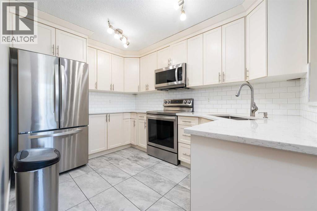 Photo 7 of 220 Bayside Point Sw, Airdrie AB
