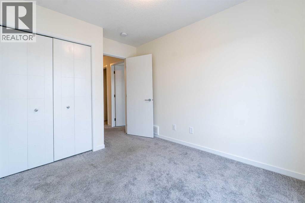 Photo 12 of 763 South Point Heath Sw, Airdrie AB