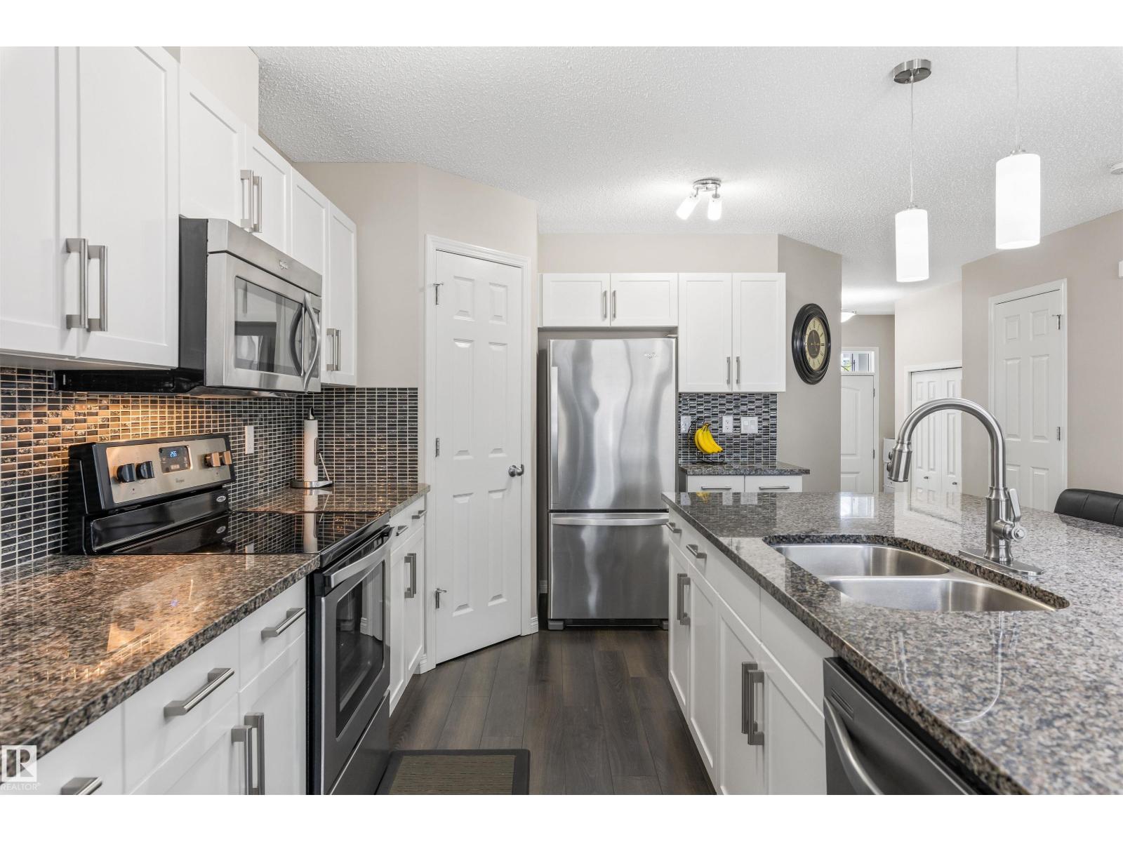 Photo 11 of 771 Eagleson Cr Nw, Edmonton AB