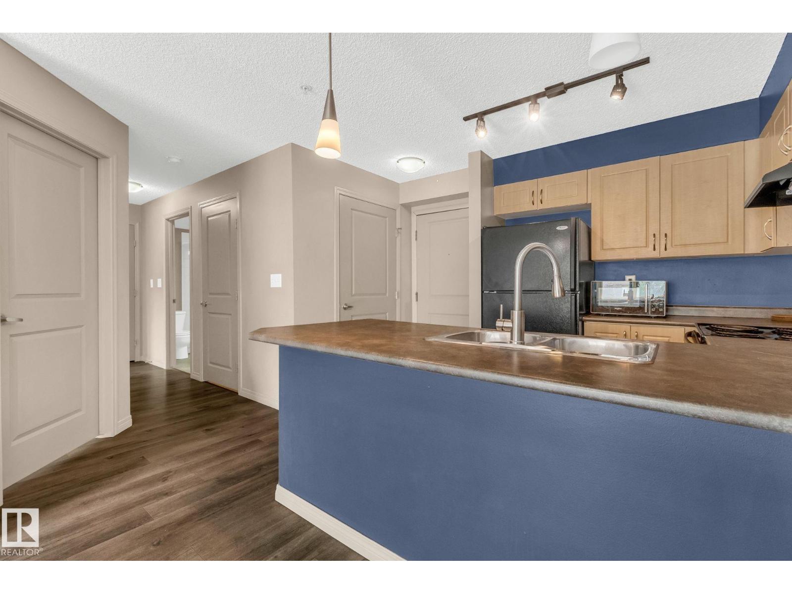 Photo 11 of 305 11441 Ellerslie Rd Sw Sw, Edmonton AB