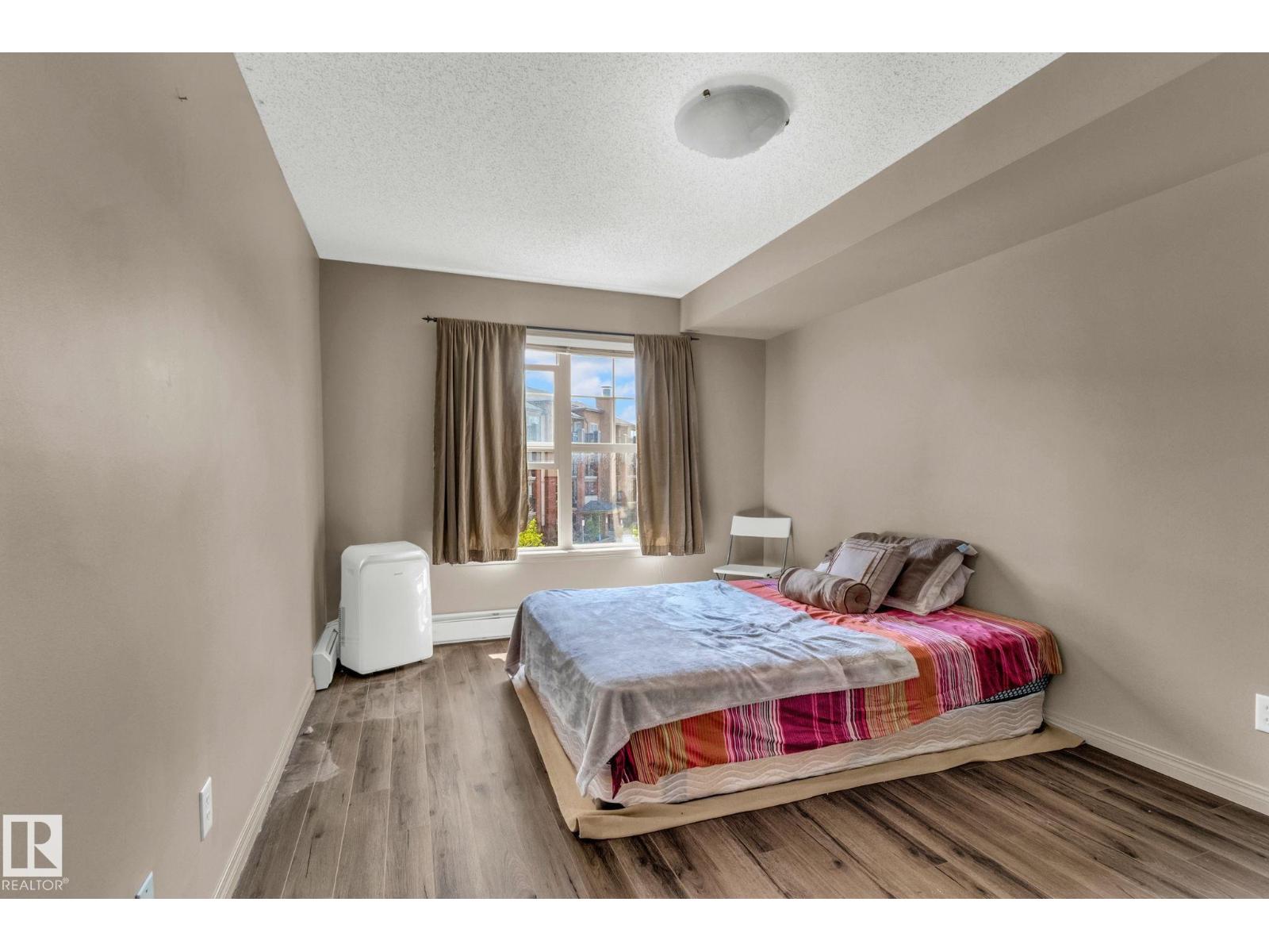 Photo 15 of 305 11441 Ellerslie Rd Sw Sw, Edmonton AB