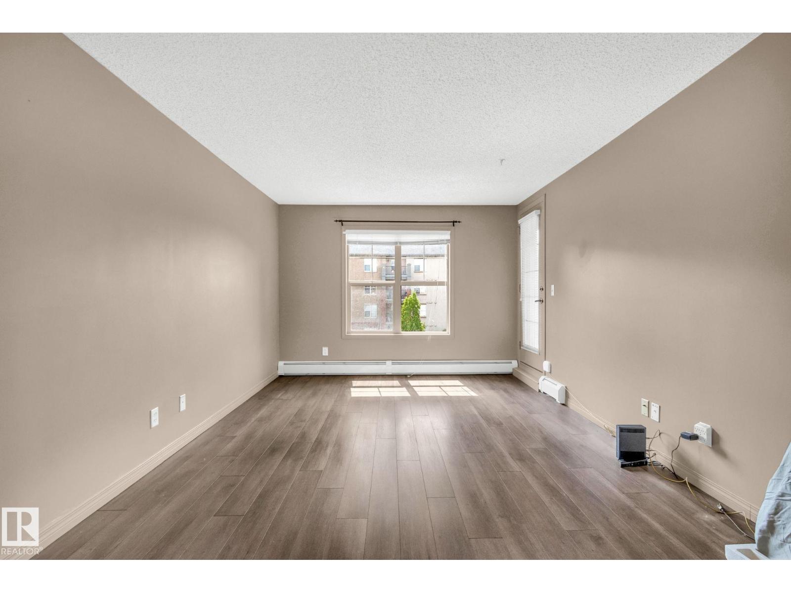 Photo 9 of 305 11441 Ellerslie Rd Sw Sw, Edmonton AB