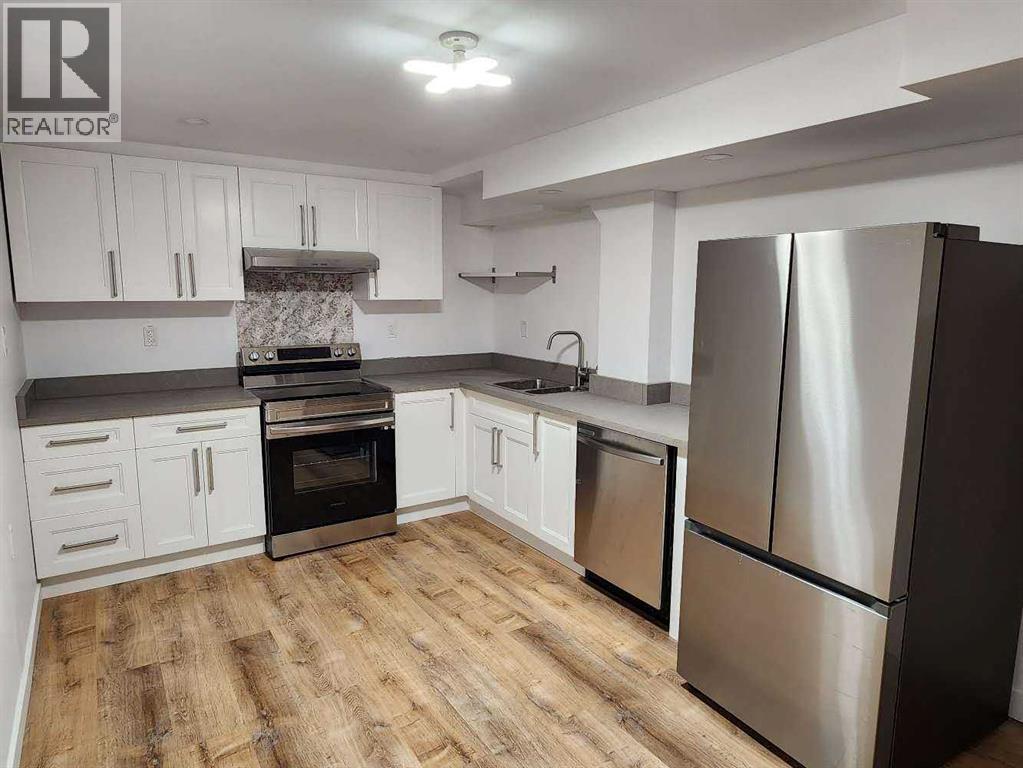 Photo 40 of 145 Straddock Terrace Sw, Calgary AB