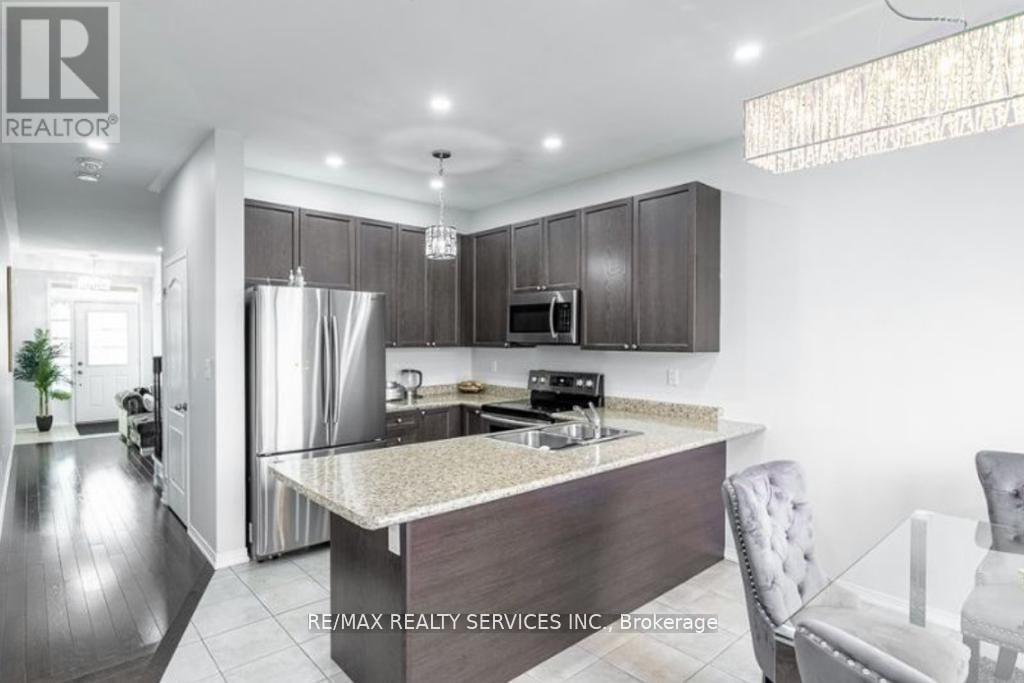 Photo 5 of 2419 Kentucky Derby Way E, Oshawa ON