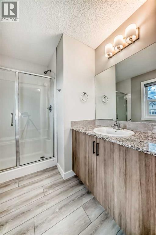 Photo 18 of 221 Midgrove Mews Sw, Airdrie AB