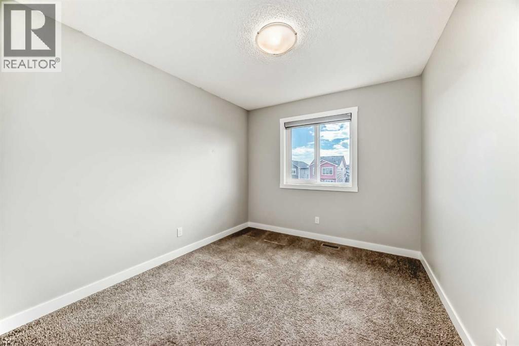 Photo 20 of 221 Midgrove Mews Sw, Airdrie AB