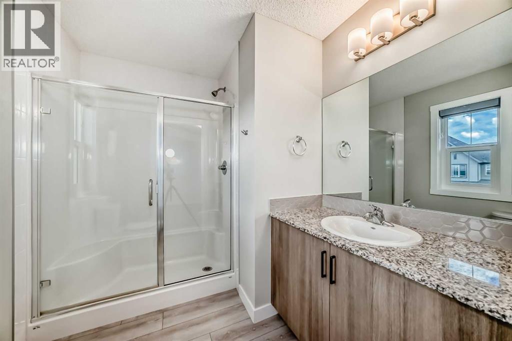 Photo 17 of 221 Midgrove Mews Sw, Airdrie AB