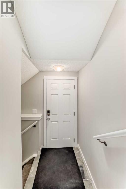 Photo 12 of 221 Midgrove Mews Sw, Airdrie AB