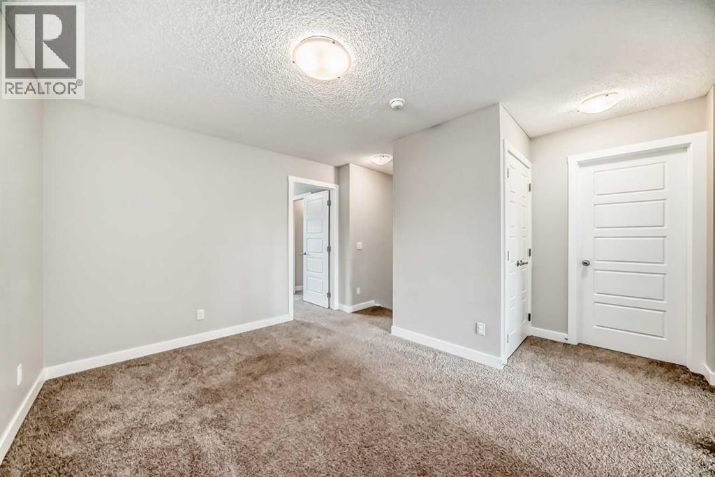 Photo 24 of 221 Midgrove Mews Sw, Airdrie AB