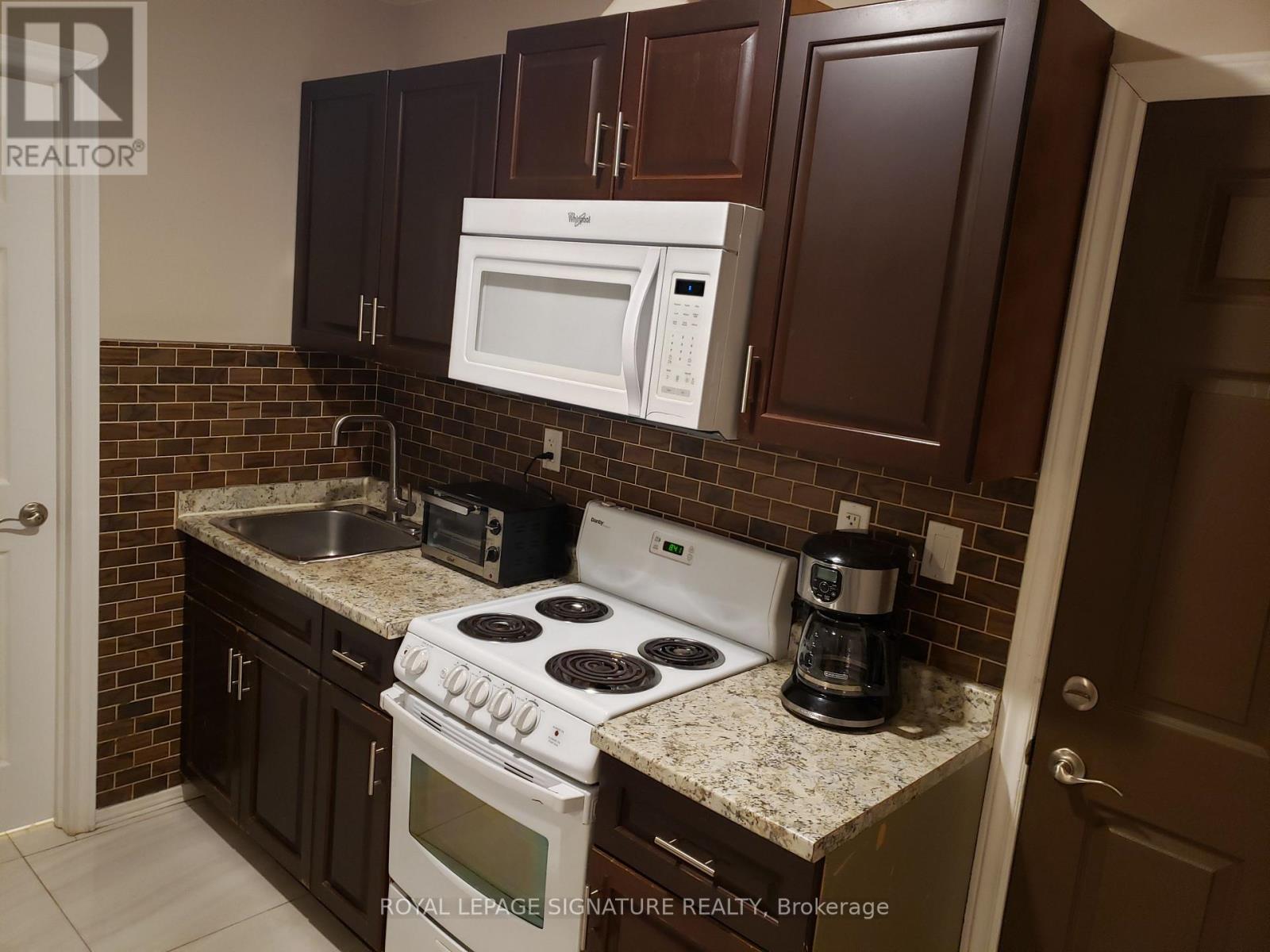 Photo 18 of 1299 1301 Danforth Avenue, Toronto ON