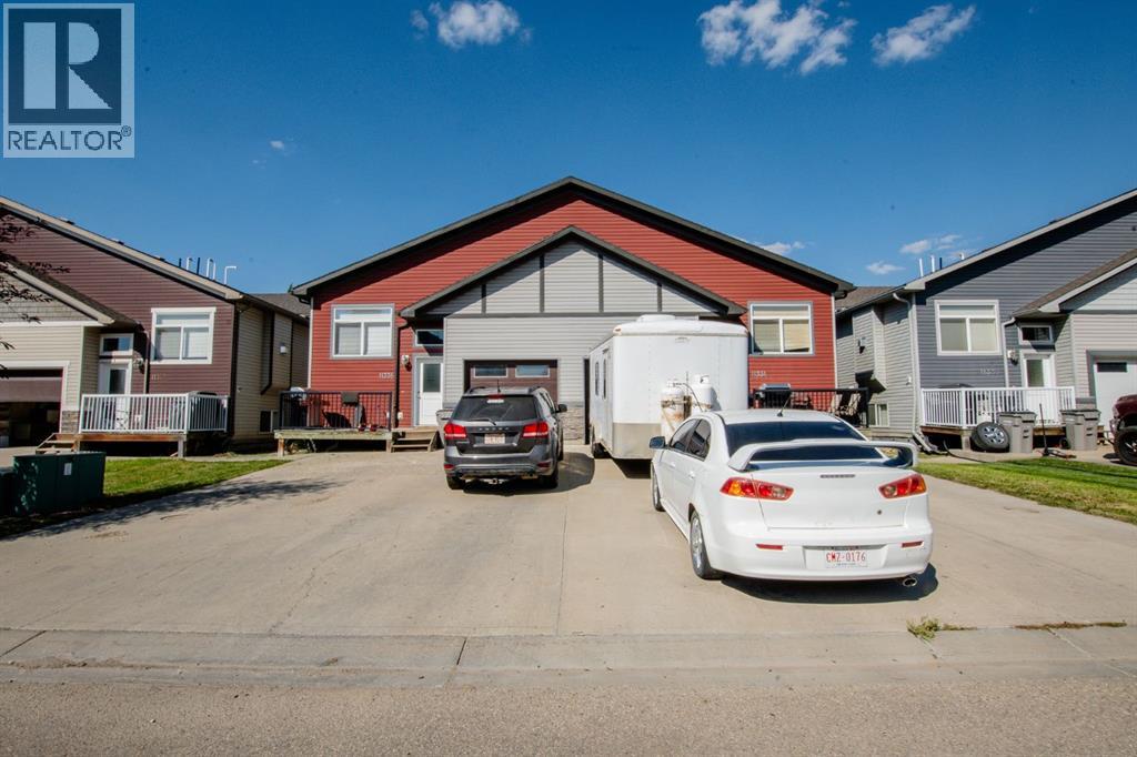 Photo 1 of 11334 105 Avenue, Grande Prairie AB