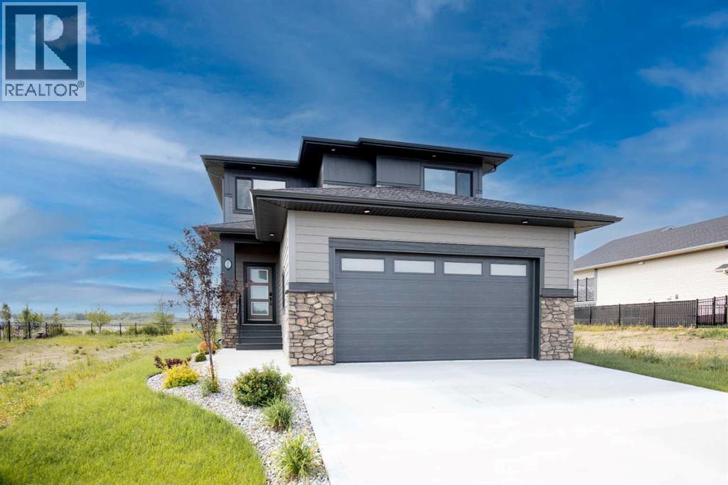 Photo 1 of 38 Springfield Boulevard, Sylvan Lake AB