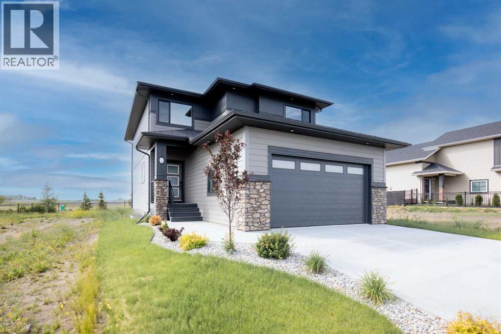 Photo 46 of 38 Springfield Boulevard, Sylvan Lake AB