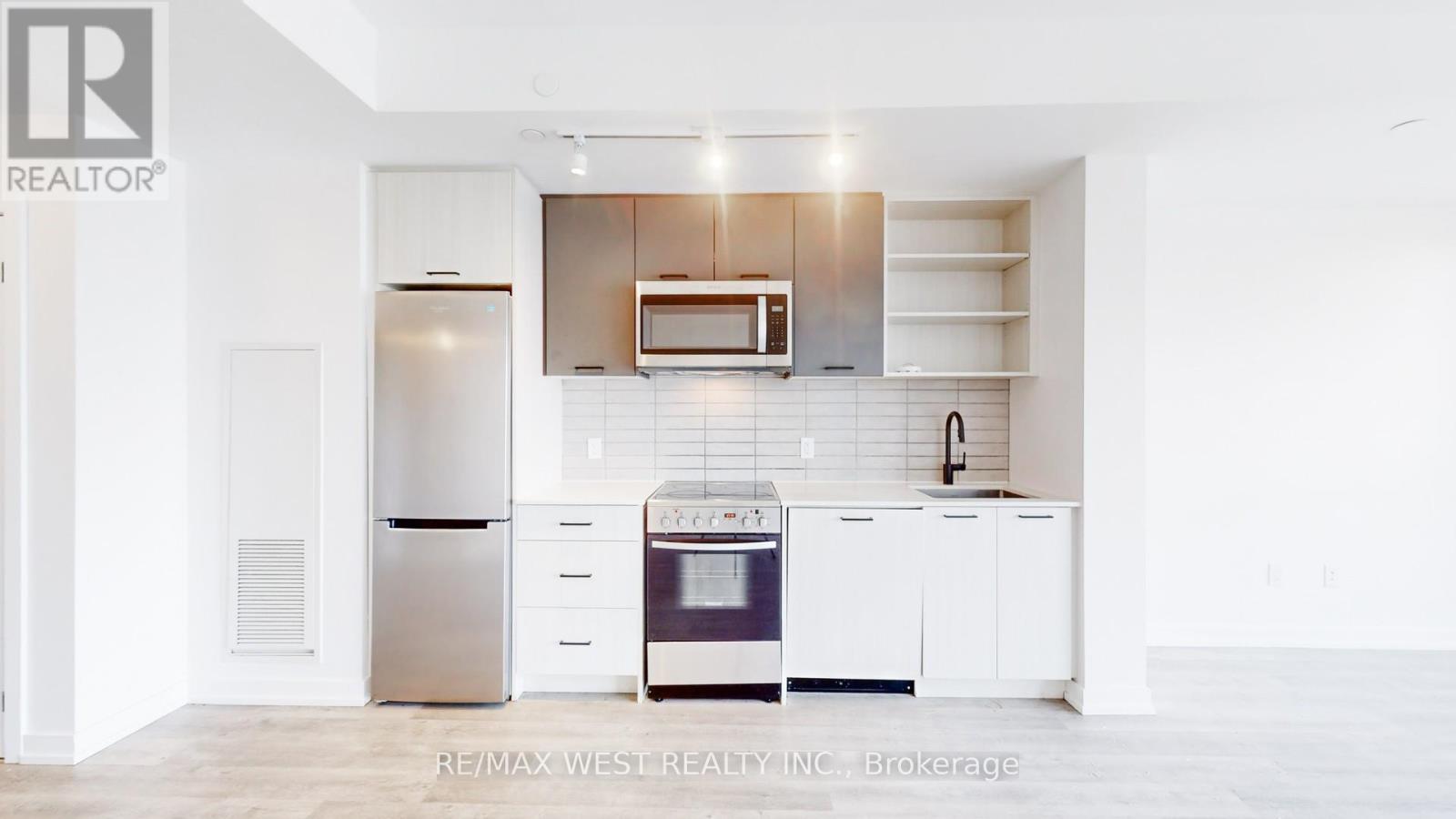 Photo 2 of 211 2300 St Clair Avenue W, Toronto ON