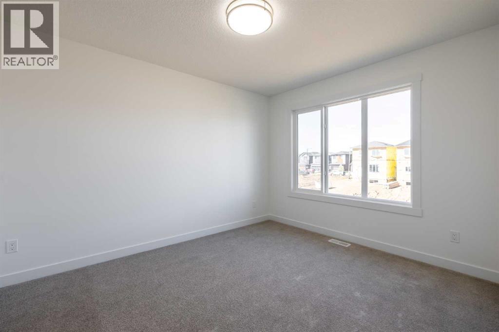 Photo 12 of 23 Appaloosa Way, Cochrane AB
