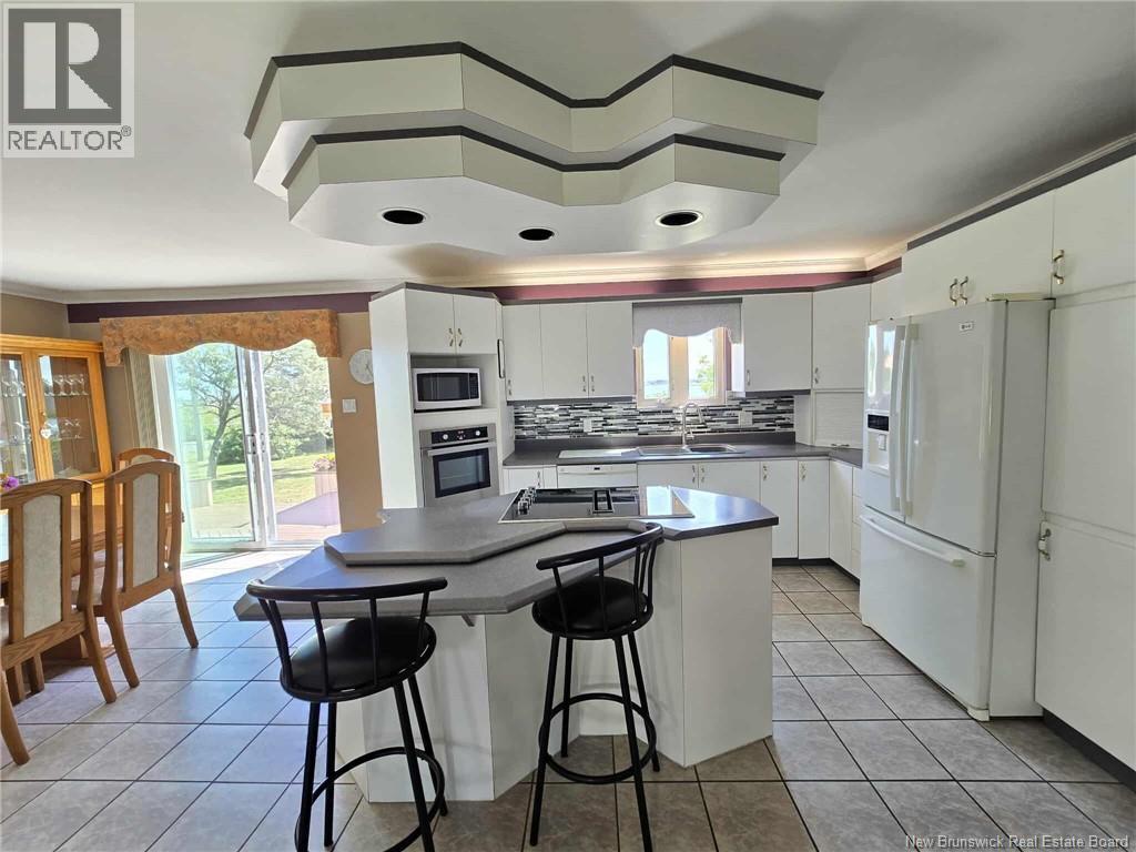 Photo 26 of 804 St Pierre Crescent, Beresford NB