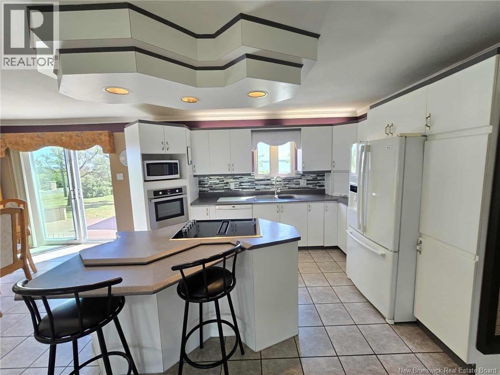 Photo 29 of 804 St Pierre Crescent, Beresford NB