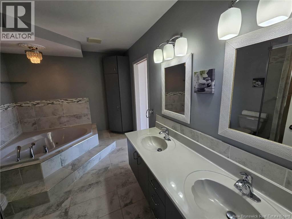 Photo 39 of 804 St Pierre Crescent, Beresford NB