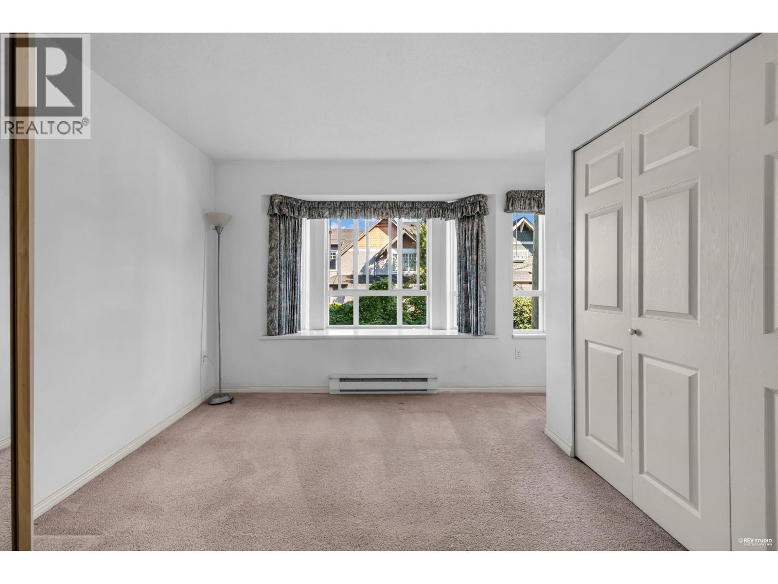Photo 20 of 211 2545 W Broadway, Vancouver BC