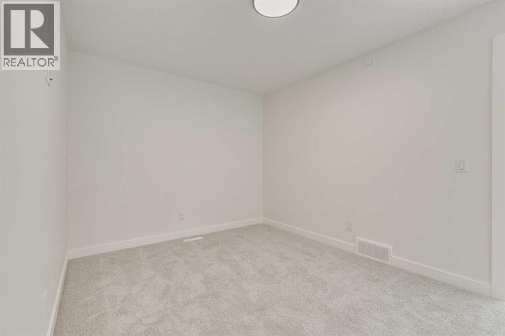 Photo 17 of 377 Hotchkiss Drive Se, Calgary AB