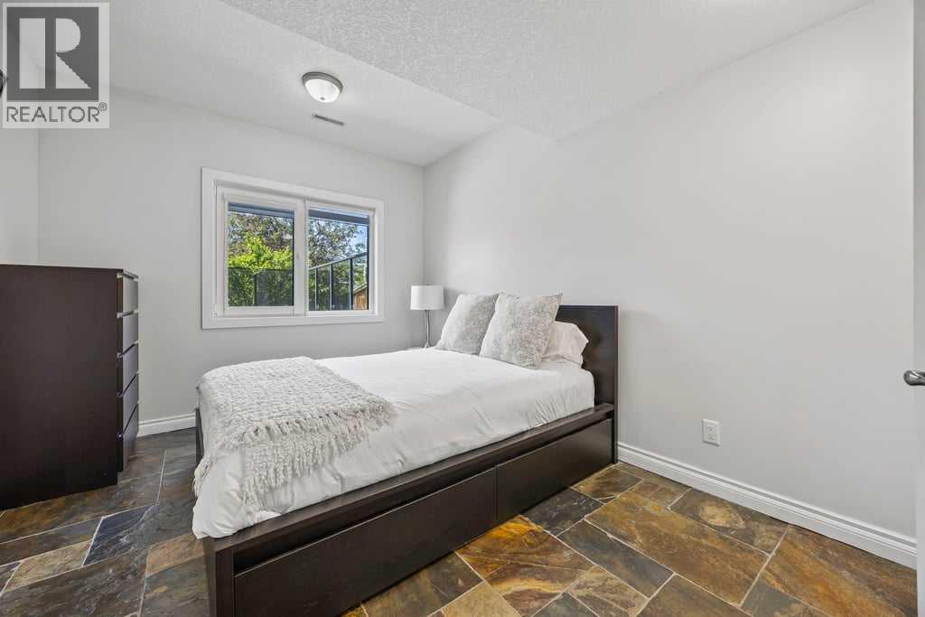 Photo 36 of 230 Bow Ridge Court, Cochrane AB