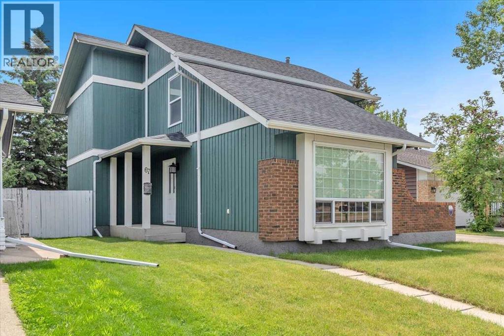 Photo 4 of 67 Woodfield Close Sw, Calgary AB