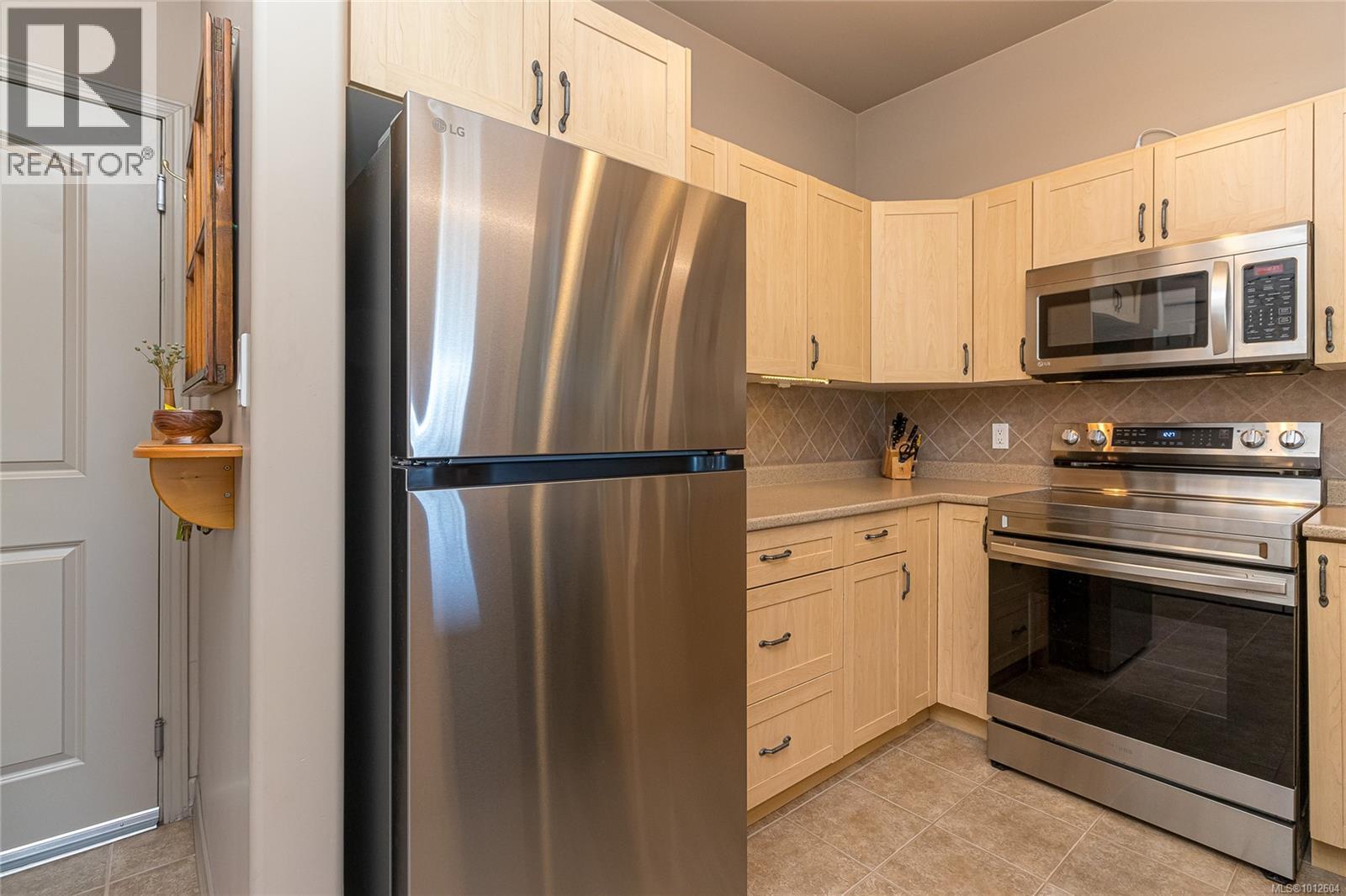 Photo 7 of 301 2706 Peatt Rd, Langford BC