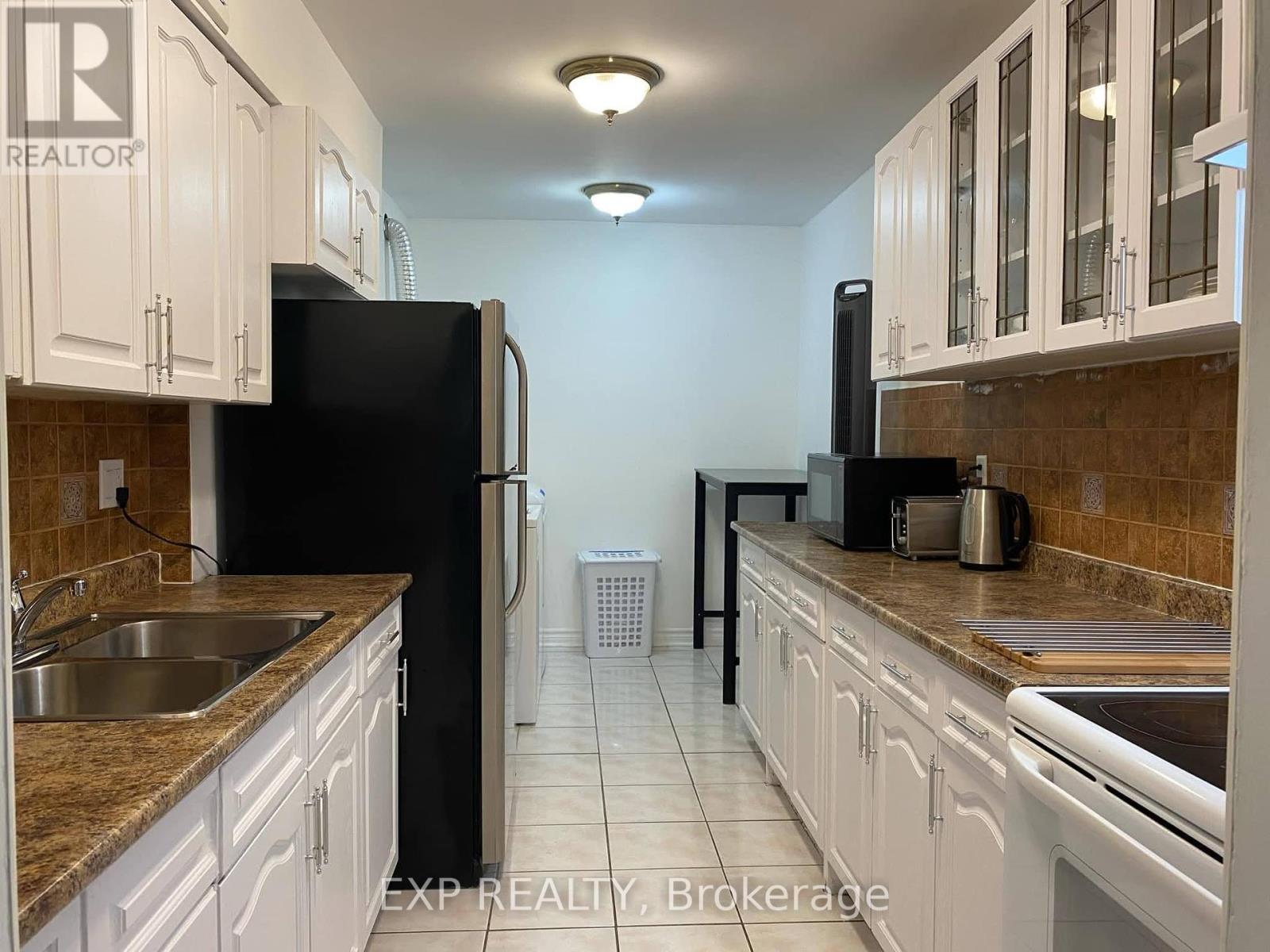 Photo 2 of 1813 320 Dixon Road, Toronto ON