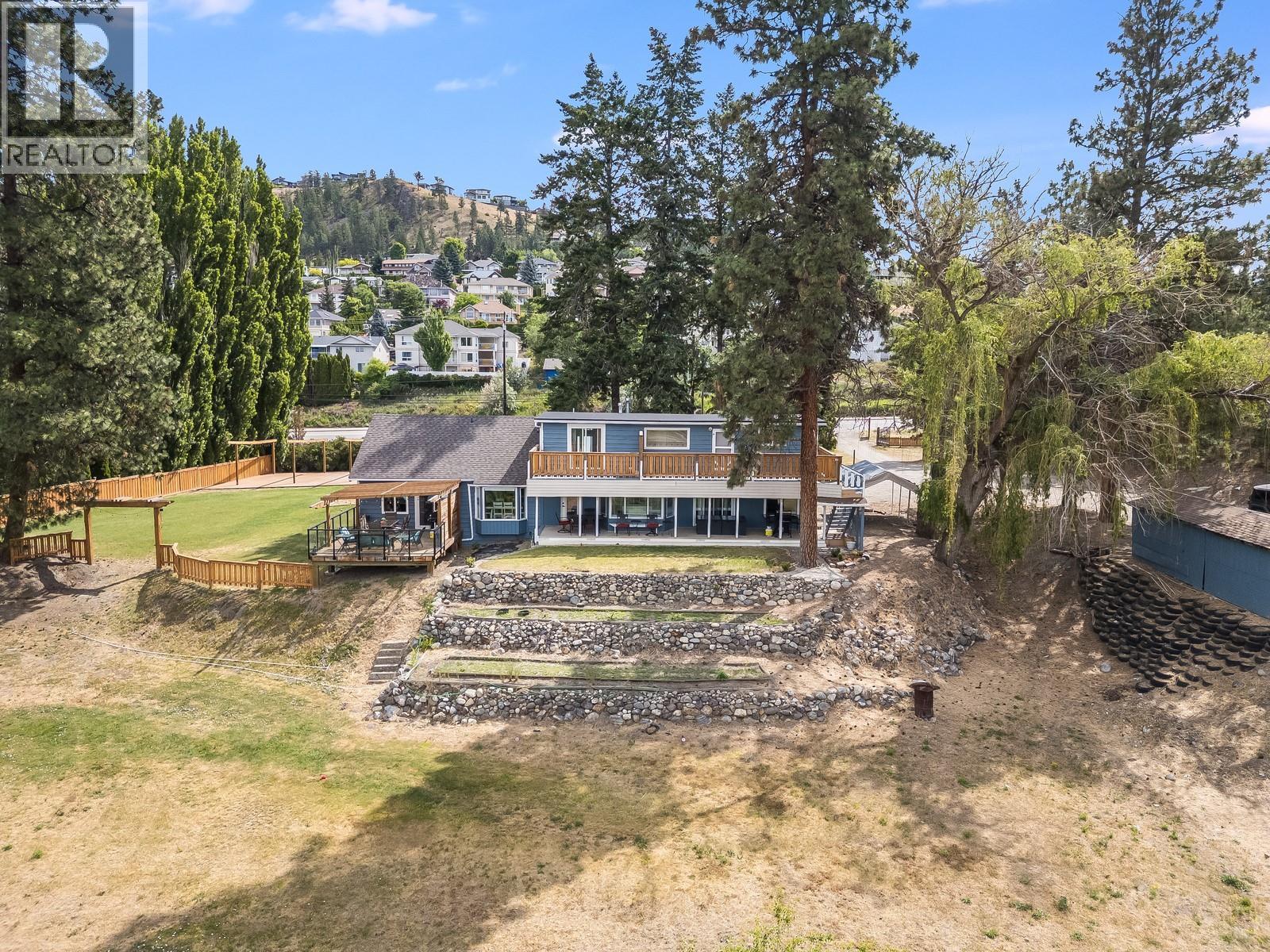 Photo 3 of 1293 Highway 33 E, Kelowna BC